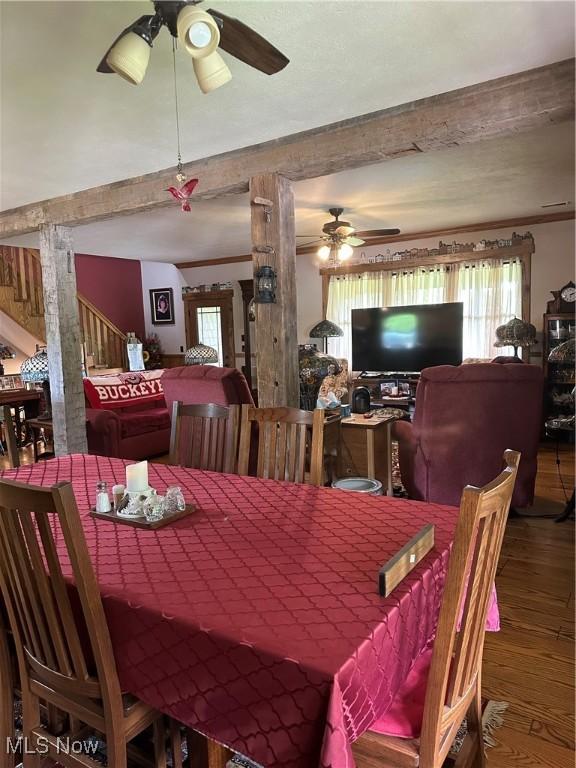 51001 Run Rd, Beallsville, OH 43716 - dining area featuring a ceiling fan, wood finished floors, and beamed ceiling