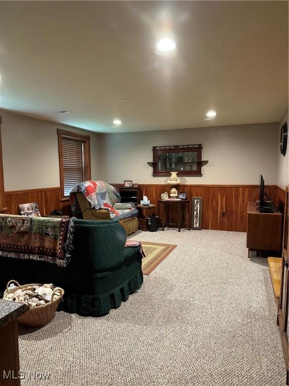 51001 Run Rd, Beallsville, OH 43716 - living room featuring wainscoting, wood walls, carpet, and recessed lighting