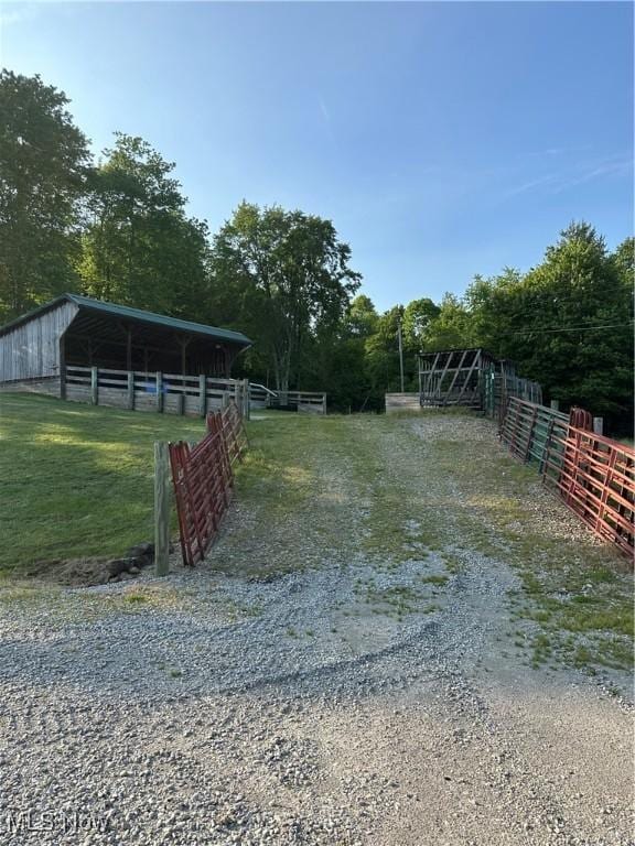 51001 Run Rd, Beallsville, OH 43716 - view of yard with driveway, an outdoor structure, and a pole building