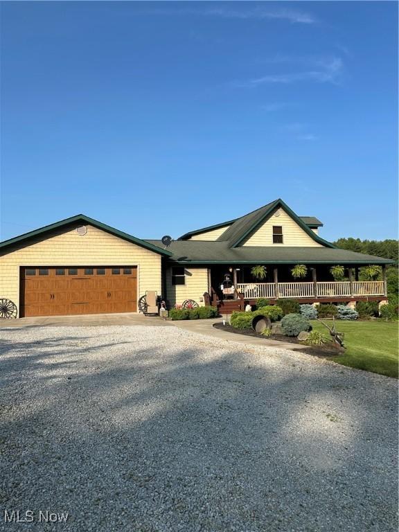51001 Run Rd, Beallsville, OH 43716 - view of front of house featuring driveway and a garage