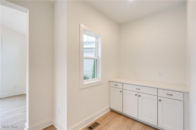 S/L12 Neptune Oval, Solon, OH 44139 - washroom with light wood-style flooring and baseboards