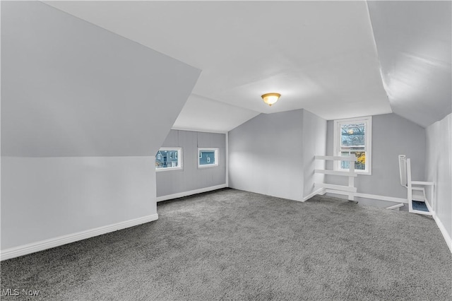 4611 W 41st St, Cleveland, OH 44109 - additional living space with vaulted ceiling, carpet, and baseboards