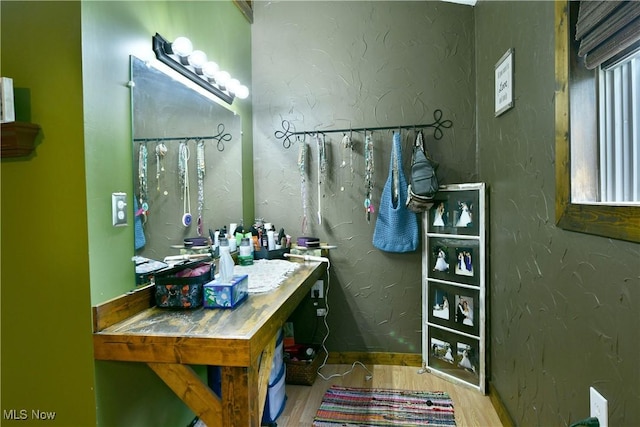 6416 Wilson Sharpsville Rd, Fowler, OH 44418 - bathroom featuring wood finished floors, a textured wall, and baseboards