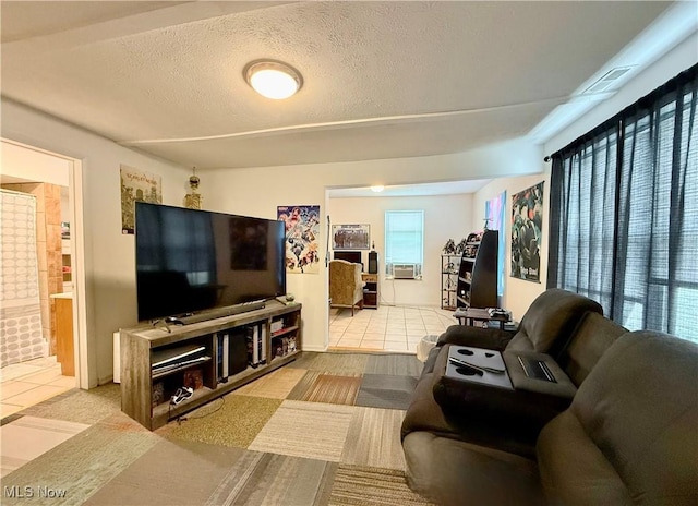 2007 Washington Blvd, Belpre, OH 45714 - living room with tile patterned floors and a textured ceiling