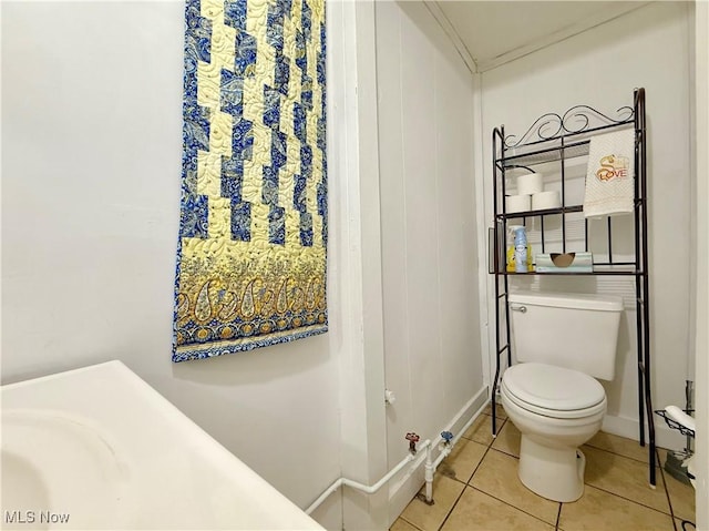 2007 Washington Blvd, Belpre, OH 45714 - bathroom featuring toilet, tile patterned flooring, and baseboards