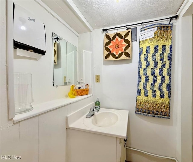 2007 Washington Blvd, Belpre, OH 45714 - bathroom featuring vanity and a textured ceiling