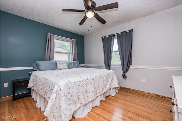 715 Locust St S, Canal Fulton, OH 44614 - bedroom with light wood finished floors and a ceiling fan