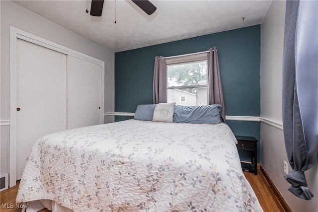 715 Locust St S, Canal Fulton, OH 44614 - bedroom featuring wood finished floors, a closet, and a ceiling fan
