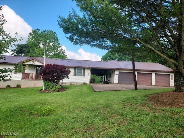 130 Maze Rd, Belpre, OH 45714 - single story home featuring a garage, a metal roof, a front yard, and concrete driveway