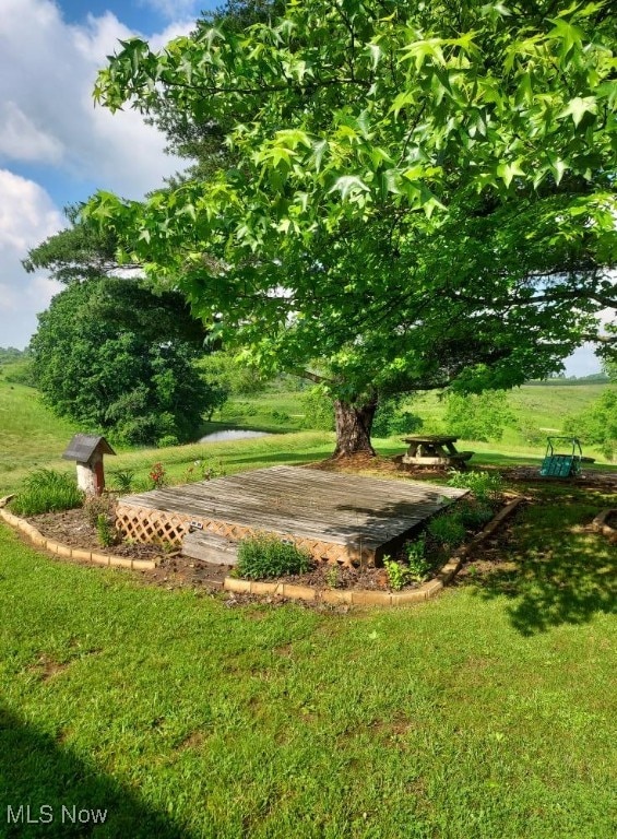 130 Maze Rd, Belpre, OH 45714 - view of grassy yard featuring a deck