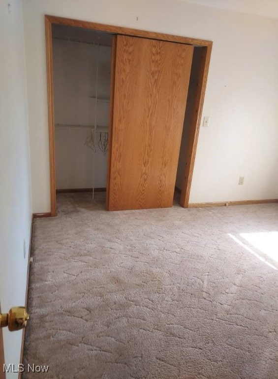 130 Maze Rd, Belpre, OH 45714 - unfurnished bedroom featuring carpet and a closet