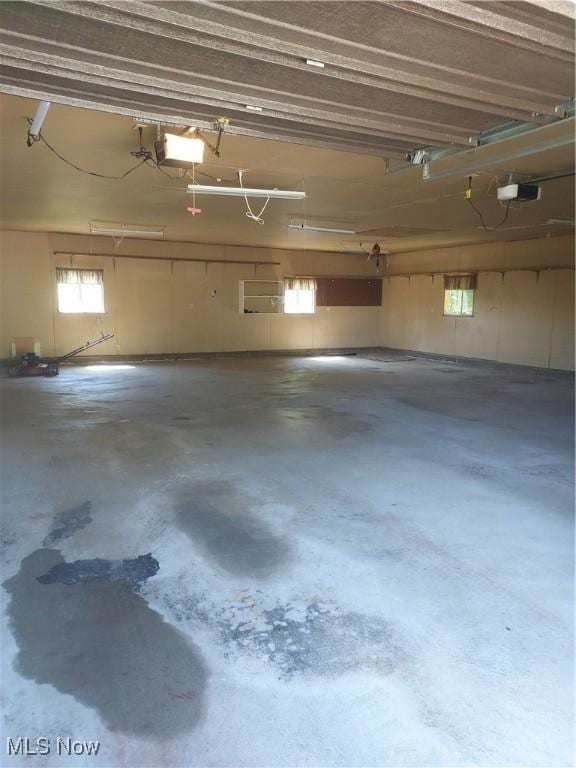 130 Maze Rd, Belpre, OH 45714 - garage featuring a garage door opener