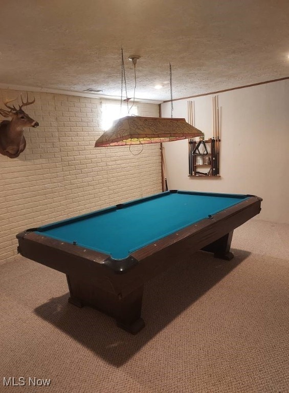 130 Maze Rd, Belpre, OH 45714 - recreation room with brick wall, pool table, carpet floors, and a textured ceiling
