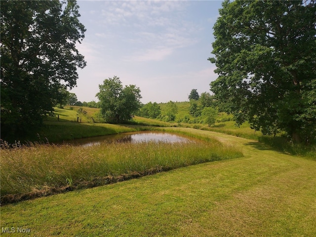 130 Maze Rd, Belpre, OH 45714 - view of property's community featuring a water view and a yard