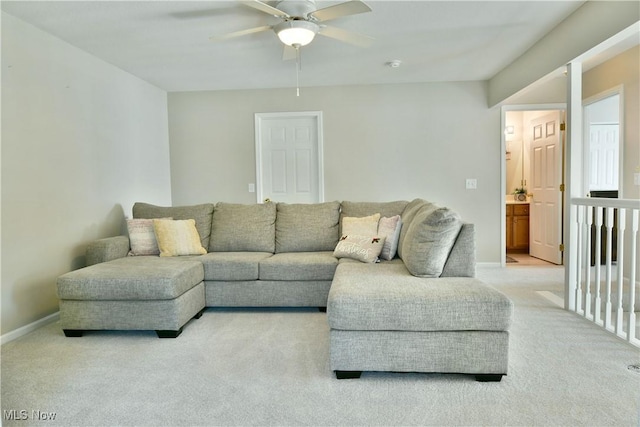 100 Turnberry Ct NE, Warren, OH 44484 - living room featuring a ceiling fan, carpet, and baseboards