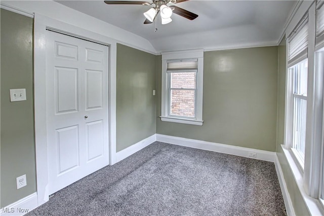 2577 Idlewood Rd, Cleveland Heights, OH 44118 - unfurnished bedroom featuring carpet flooring, baseboards, ceiling fan, and lofted ceiling