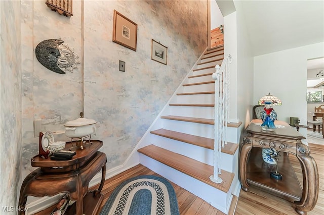 23903 E Baintree Rd, Beachwood, OH 44122 - staircase with wood finished floors and baseboards