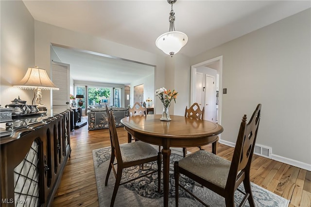 23903 E Baintree Rd, Beachwood, OH 44122 - dining space featuring wood finished floors and baseboards
