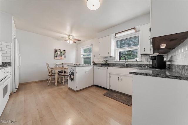 23903 E Baintree Rd, Beachwood, OH 44122 - kitchen with white appliances, a sink, tasteful backsplash, and a ceiling fan