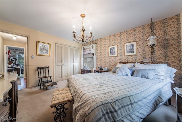 23903 E Baintree Rd, Beachwood, OH 44122 - bedroom featuring a chandelier, light carpet, and a closet