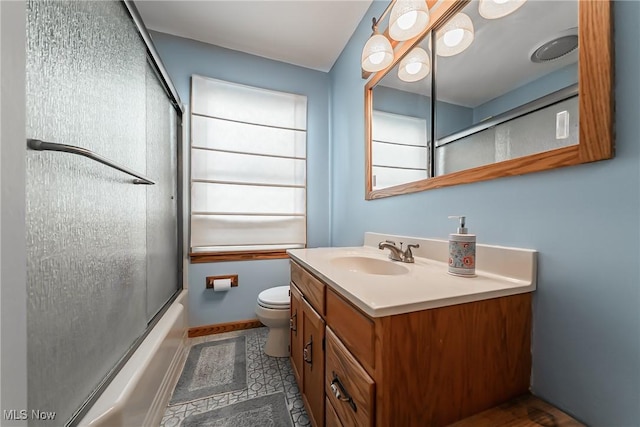 23903 E Baintree Rd, Beachwood, OH 44122 - bathroom featuring toilet, vanity, and shower / bath combination with glass door