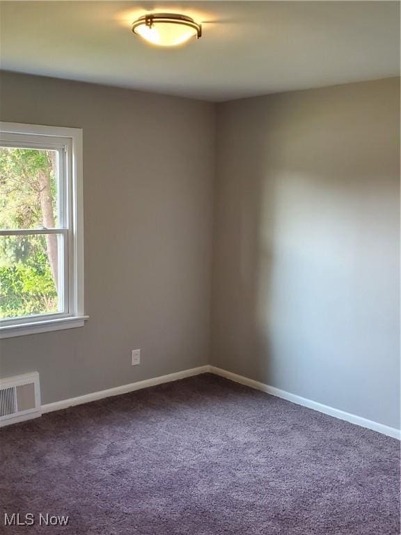 7007 Biddulph Rd, Brooklyn, OH 44144 - unfurnished room featuring dark carpet and baseboards