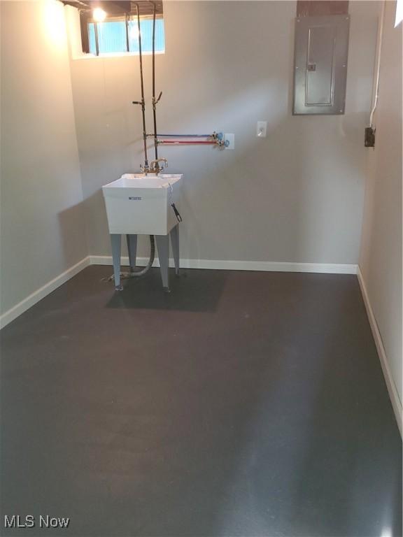7007 Biddulph Rd, Brooklyn, OH 44144 - laundry area featuring electric panel and baseboards
