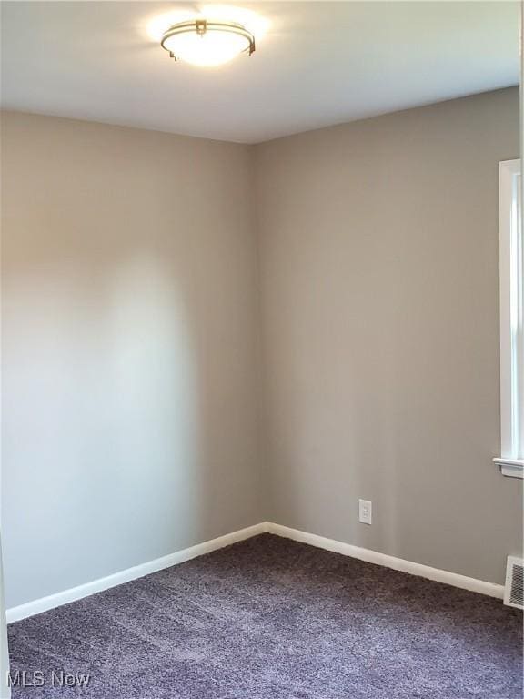 7007 Biddulph Rd, Brooklyn, OH 44144 - carpeted spare room with baseboards