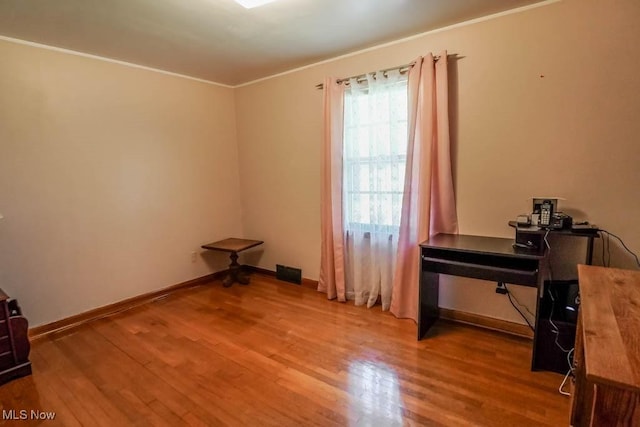 5920 Renninger Rd, New Franklin, OH 44319 - miscellaneous room with ornamental molding, wood finished floors, and baseboards
