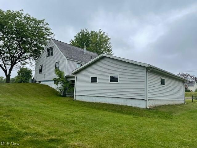 2410 Perry Dr SW, Canton, OH 44706 - view of side of property featuring a yard