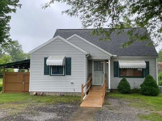 2410 Perry Dr SW, Canton, OH 44706 - view of front facade featuring a shingled roof