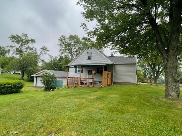2410 Perry Dr SW, Canton, OH 44706 - back of house featuring a yard