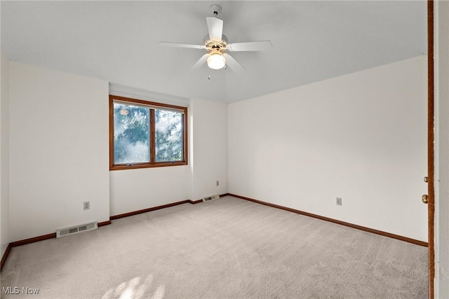 5011 Buttonbush Ln, North Royalton, OH 44133 - unfurnished room featuring carpet floors, a ceiling fan, and baseboards