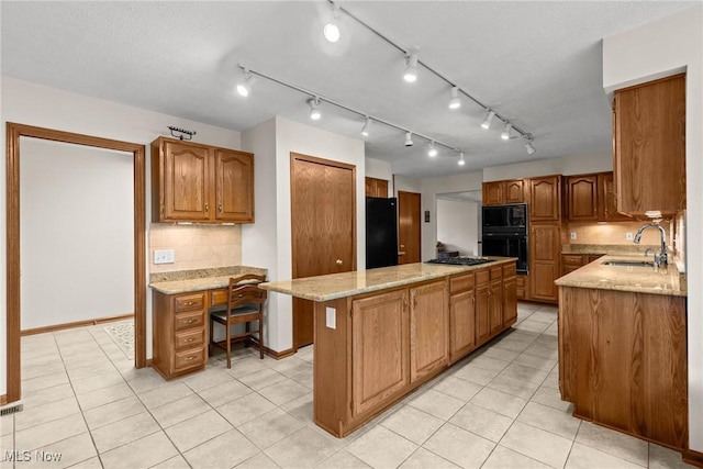 5011 Buttonbush Ln, North Royalton, OH 44133 - kitchen with black appliances, a sink, a center island, and decorative backsplash