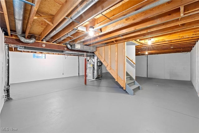 5011 Buttonbush Ln, North Royalton, OH 44133 - unfinished basement featuring stairs and heating unit