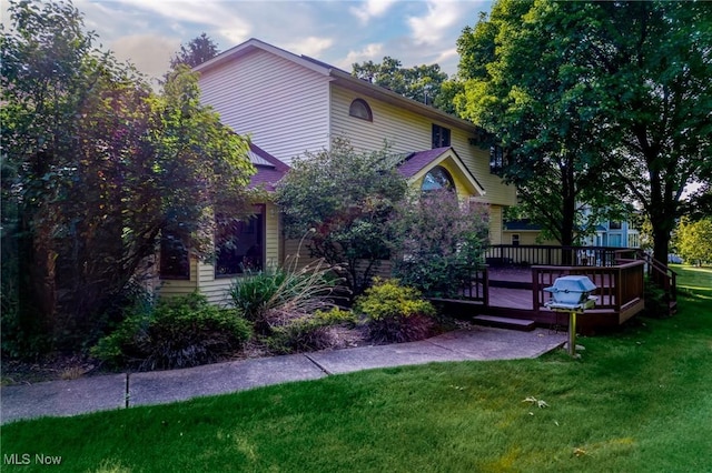 5011 Buttonbush Ln, North Royalton, OH 44133 - back of property with a wooden deck and a yard