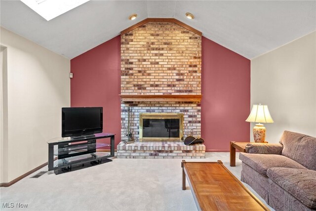 5011 Buttonbush Ln, North Royalton, OH 44133 - living area with lofted ceiling, carpet, a brick fireplace, and baseboards