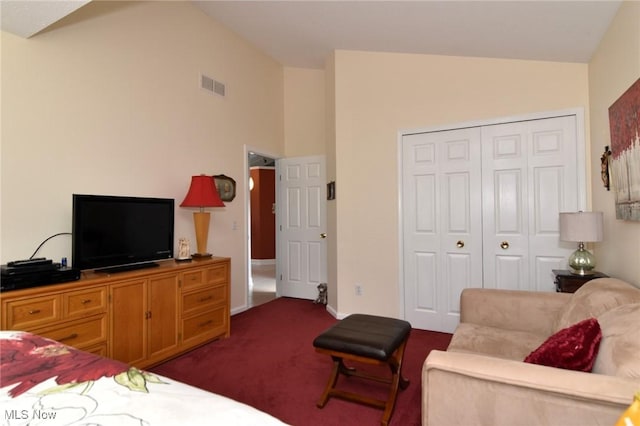335 Devon Pond, Aurora, OH 44202 - bedroom with dark colored carpet, a closet, baseboards, and high vaulted ceiling