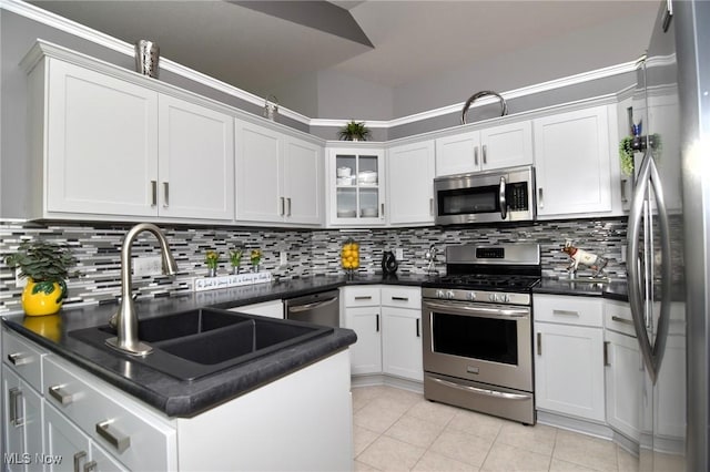 335 Devon Pond, Aurora, OH 44202 - kitchen featuring appliances with stainless steel finishes, a sink, and dark countertops