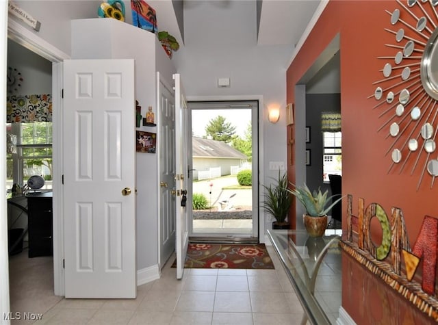335 Devon Pond, Aurora, OH 44202 - foyer featuring light tile patterned flooring and baseboards