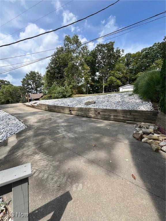 86 Cheyenne Trl, Malvern, OH 44644 - view of road featuring view of scattered trees