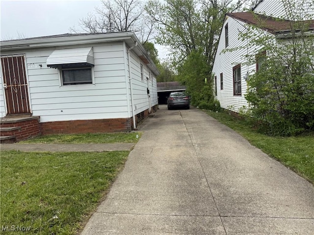 4549 Lee Rd, Cleveland, OH 44128 - view of home's exterior with concrete driveway