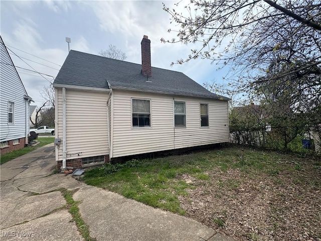 4154 E 153rd St, Cleveland, OH 44128 - rear view of property featuring a chimney