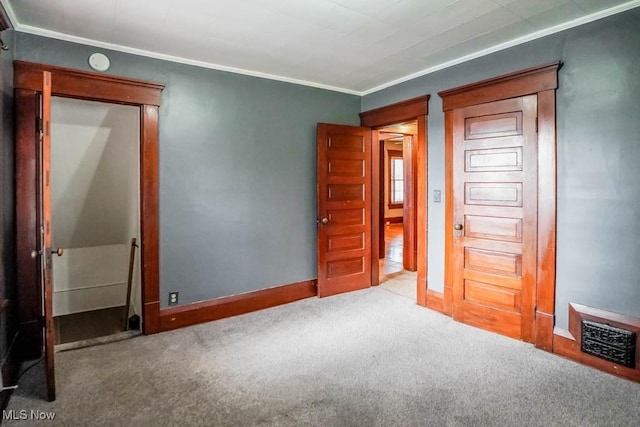 490 N Main St, Magnolia, OH 44643 - unfurnished bedroom featuring carpet flooring, baseboards, and crown molding