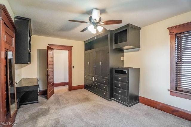 490 N Main St, Magnolia, OH 44643 - carpeted bedroom with baseboards and ceiling fan