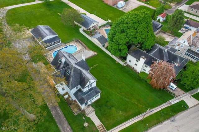 490 N Main St, Magnolia, OH 44643 - aerial perspective of suburban area featuring a pool area