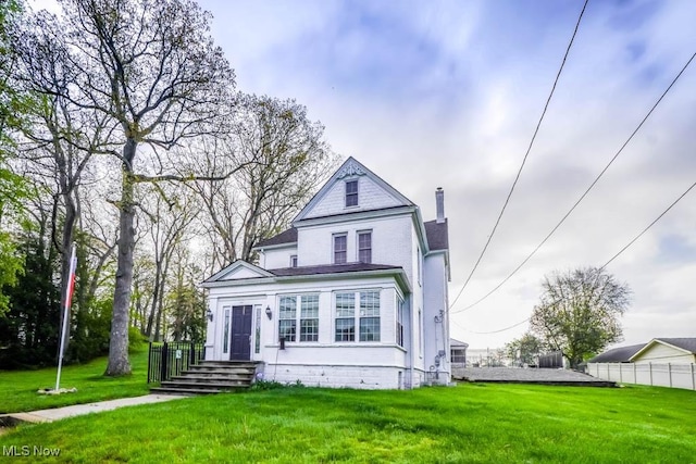 490 N Main St, Magnolia, OH 44643 - view of front of house featuring a chimney