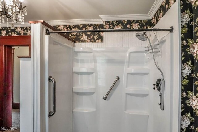490 N Main St, Magnolia, OH 44643 - bathroom featuring a shower stall and crown molding