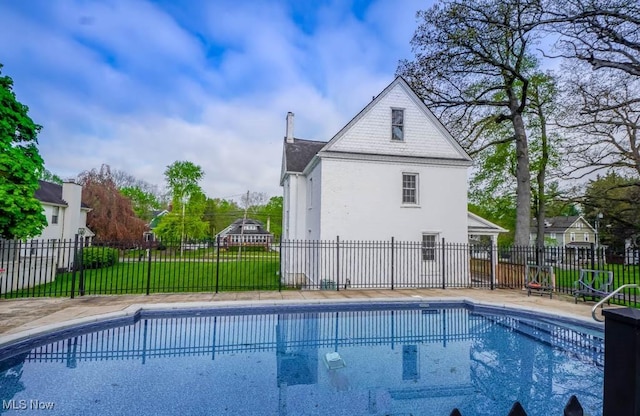 490 N Main St, Magnolia, OH 44643 - view of swimming pool with a patio