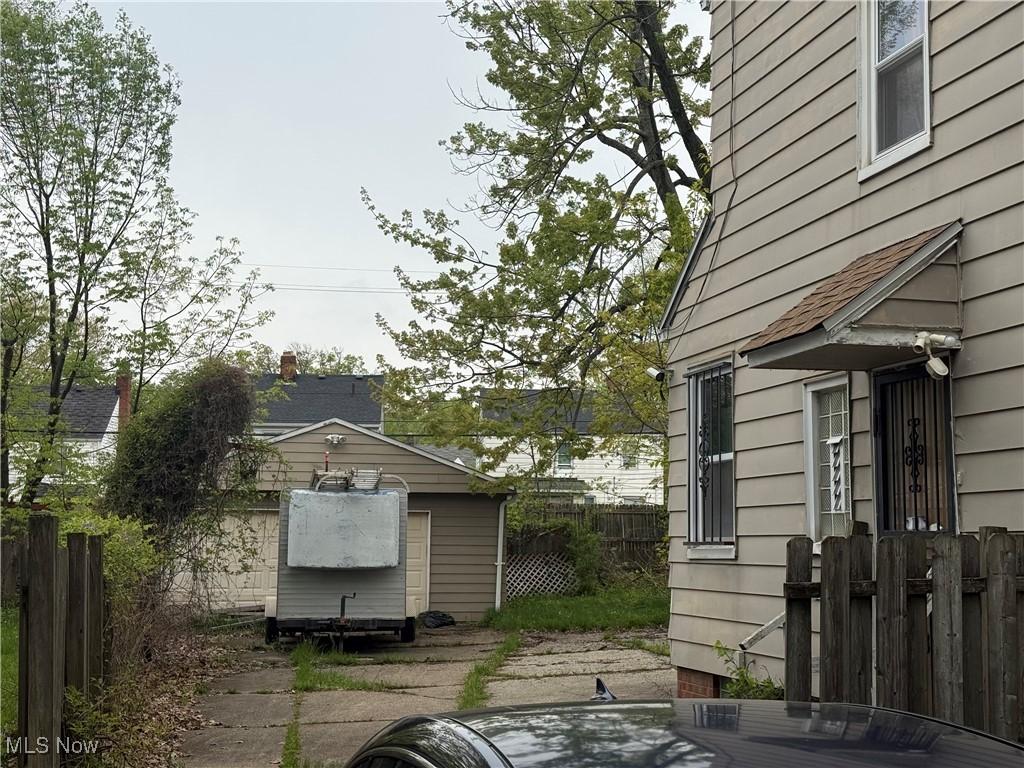 16707 Stockbridge Ave, Cleveland, OH 44128 - view of home's exterior featuring an outbuilding